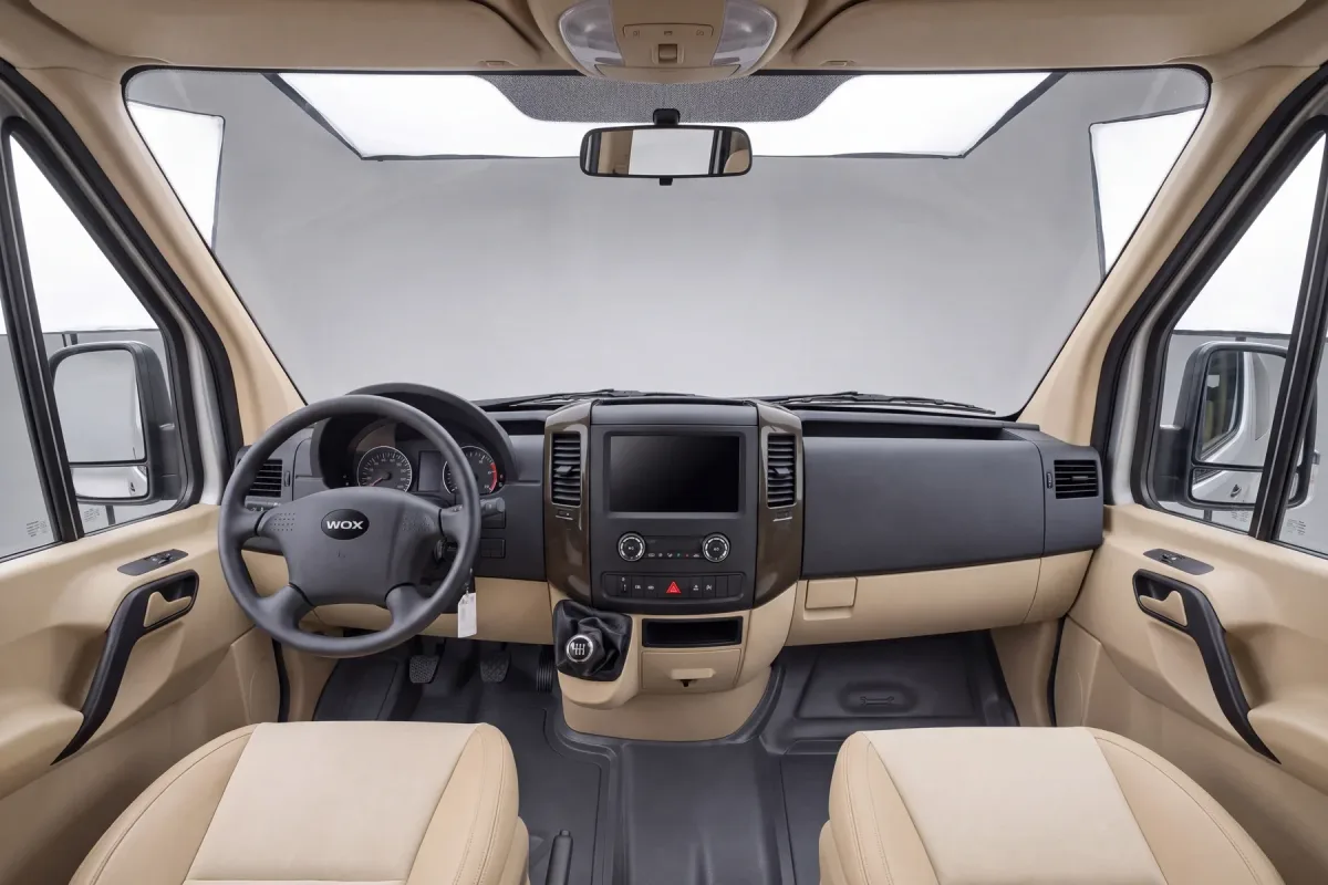 WOX MOVA driver cockpit — 3.5-inch LCD display and 9-inch central control display