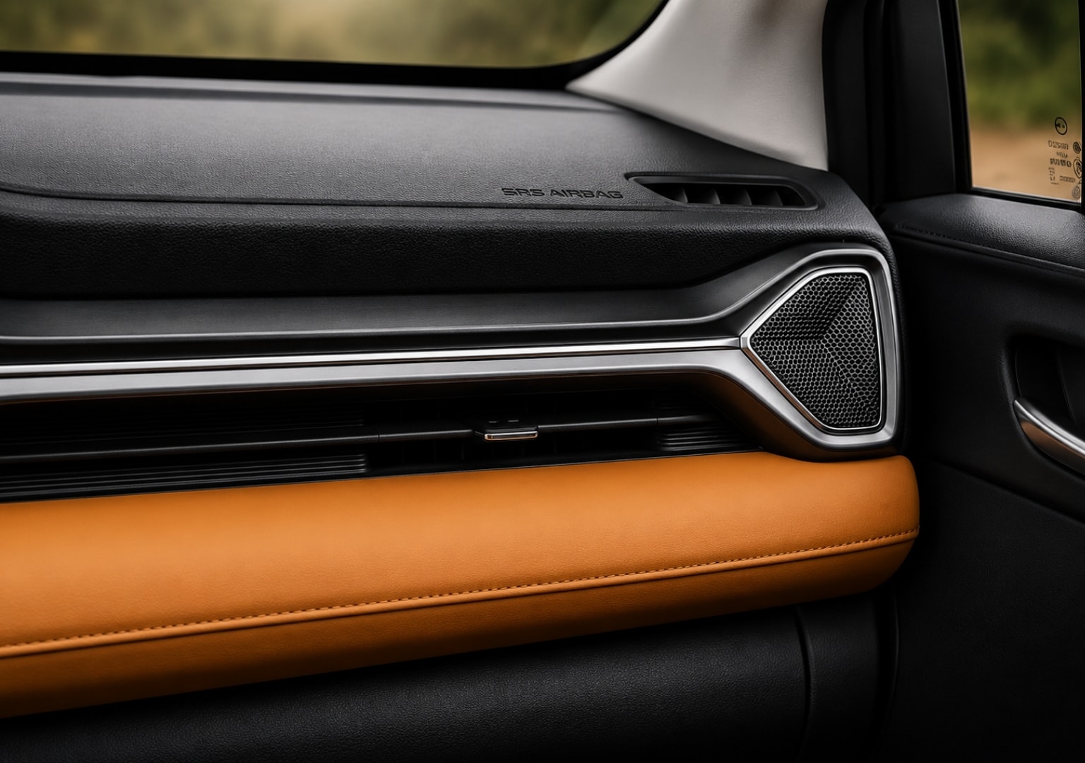 WOX NEO — dashboard speaker grille and SRS airbag trim detail