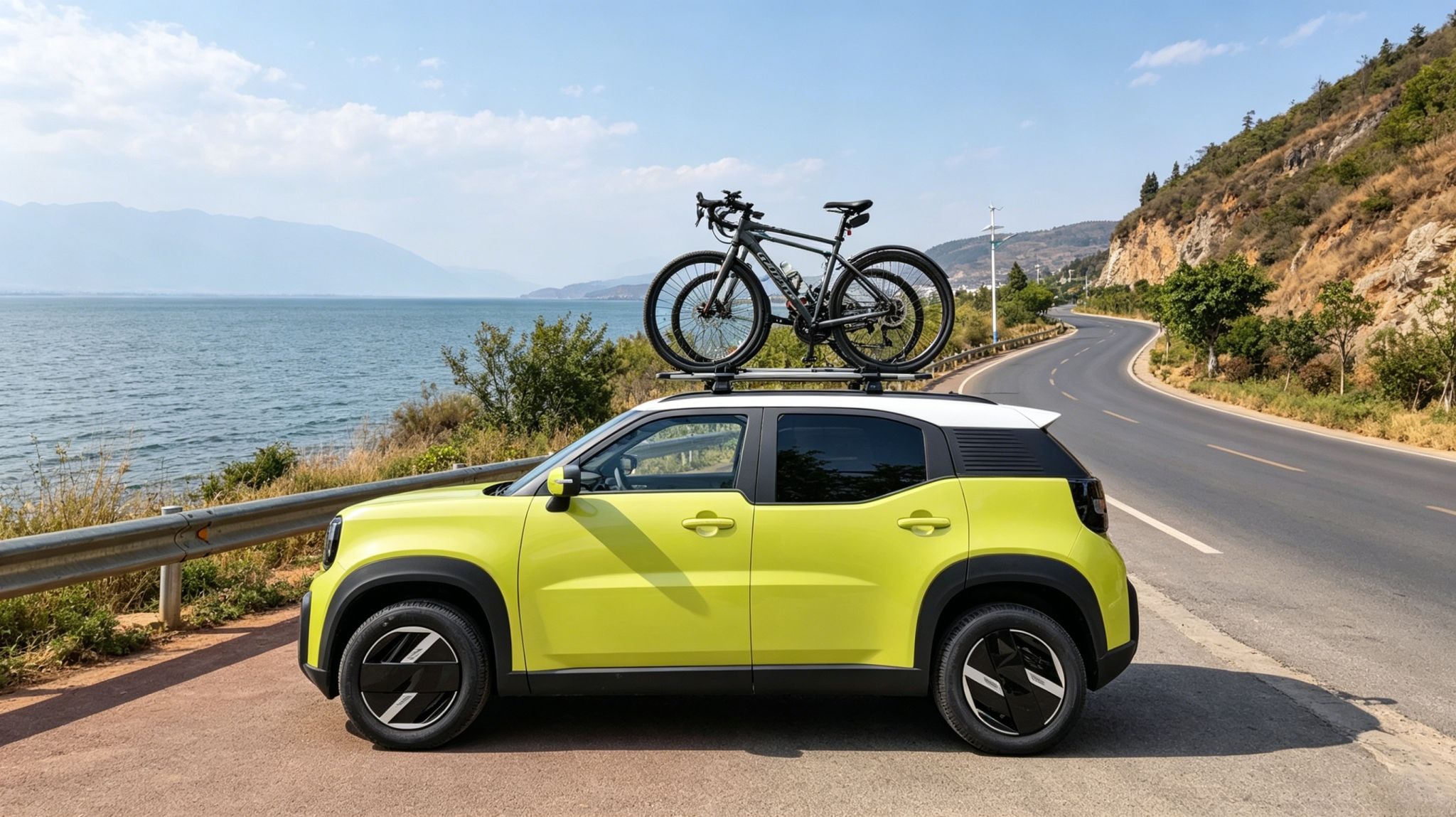 WOX Pixel on a coastal road with bike rack — demonstrating roof-rail versatility